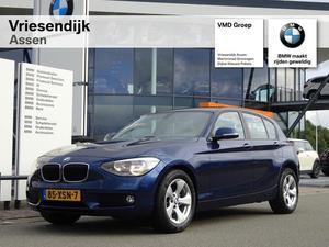 BMW 1-serie 116I BUSINESS, Cruise control, Navigatie systeem,Regen- en lichtsensor, USB- aansluiting Zeer comple