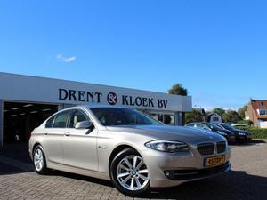 BMW 5-serie 520i HIGH EXECUTIVE SCHUIFKANTELDAK   LEER   NAVIGATIE