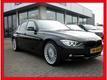 BMW 3-serie 328I HIGH EXECUTIVE Leder interieur navigatie schuifdak head-up topview camera 6 Mnd BOVAG Garantie