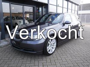 BMW 3-serie Touring 330i High Executive LEER PANO NAVI