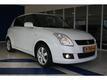 Suzuki Swift 1.3 LIMITED Wit metallic en LEER met 6 maanden garantie!