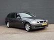 BMW 3-serie Touring 320i High Executive