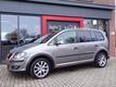 Volkswagen Touran 1.4 TSI CROSS DSG 7pers. Xenon Leer Stoerverwarming PDC Navi Schuifdak Trekhaak