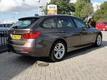 BMW 3-serie Touring 320D AUT HIGH EXECUTIVE GR NAVI LEER SPORTST XENON PDC