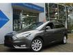 Ford Focus Wagon 1.0 ECOBOOST 125PK TITANIUM RIJKLAAR | NAVI | CLIMA | CRUISE | PDC | PRIVACY GLASS | 16``LM