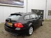 BMW 3-serie Touring 318i Business Line Style Leer | Navi Pro | Dealer onderhouden