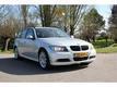 BMW 3-serie Touring 320I BUSINESS LINE LEER NAVI CLIMA PDC NAP