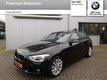 BMW 1-serie 116i Upgrade Edition Schuifdak Leer Navi Pro Xenon