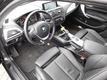 BMW 1-serie 116i Upgrade Edition Schuifdak Leer Navi Pro Xenon