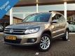 Volkswagen Tiguan 2.0 TDI 140 pk Sport&Style 4Motion | Bi-Xenon | Panoramadak | Navi | Standkachel | PDC v a incl. aut