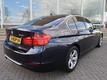 BMW 3-serie 320I UPGRADE EDITION MODERN LINE