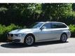 BMW 3-serie Touring 318D LUXURY LINE AUTOMAAT | SPORTSTOELEN | PANO-DAK | GR. NAVI