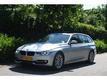 BMW 3-serie Touring 318D LUXURY LINE AUTOMAAT | SPORTSTOELEN | PANO-DAK | GR. NAVI