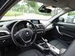 BMW 1-serie 116d Business 5drs, Navigatie, Cruise Control, Bluetooth, Parkeersensoren, Isofix