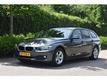 BMW 3-serie 318D UPGRADE EDITION | ZWARTE HEMEL | NAVI ZWART LEDER