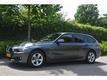 BMW 3-serie 318D UPGRADE EDITION | ZWARTE HEMEL | NAVI ZWART LEDER