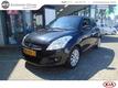 Suzuki Swift 1.2 EXCLUSIVE 5 DRS 1e EIG. van € 9.945 voor € 9.495