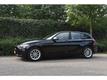 BMW 1-serie 116D EDE EXECUTIVE LEDER | NAVI | STOELVERW.