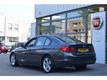 BMW 3-serie 320i High Executive groot navi automaat