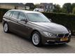 BMW 3-serie Touring 320D Luxury Line Aut 184Pk Leer Gr.Navi Xenon PDC LMV Nieuwstaat